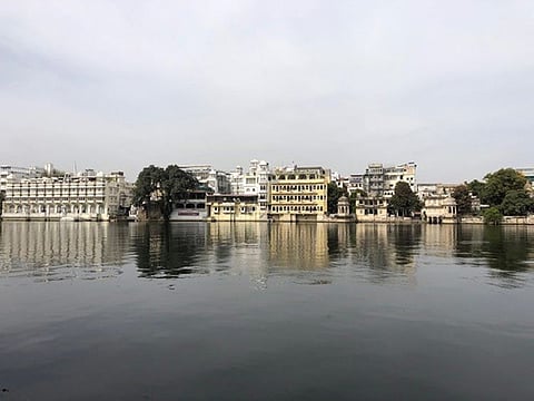  The calm waters of Lake Pichola belie the colourful life that thrives in the narrow lanes of the old city of Udaipur, skirting this manmade water body.