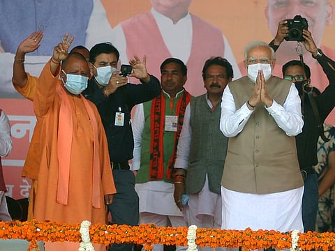 Prime Minister Narendra Modi gestures during an elections rally for the seventh and last phase of the Uttar Pradesh Assembly elections, in Mirzapur on Friday. Uttar Pradesh Chief Minister Yogi Adityanath was also present
