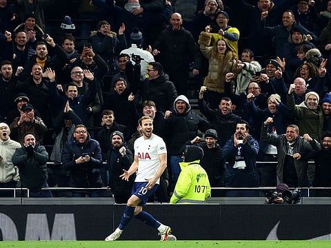 Tottenham Hotspur's Harry Kane celebrates scoring their fifth goal against Everton