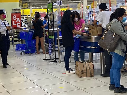 A checkout counter at a grocery in the Philippines. COVID-19 has taken a heavy toll on livelihoods and small businesses. Loss of income and job opportunities were overarching challenges in many communities.