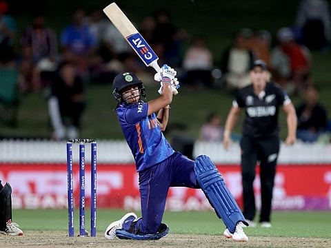 India's Harmanpreet Kaur plays a shot during the 2022 Women's Cricket World Cup match between New Zealand and India at Seddon Park in Hamilton.