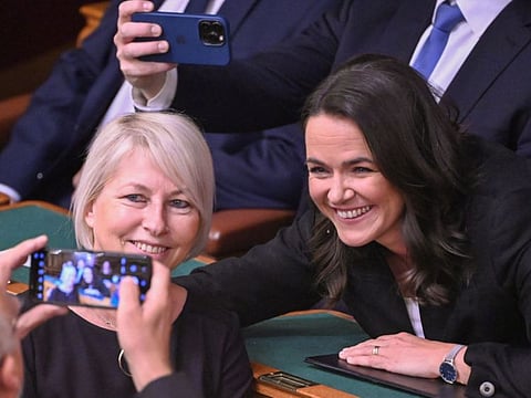 Hungary's candidate for President Katalin Novak (right) poses for a picture with representative of the Hungarian parliament Katalin Csobor at the parliament building in Budapest on March 10, 2022 prior to a secret vote of the presidential position.  