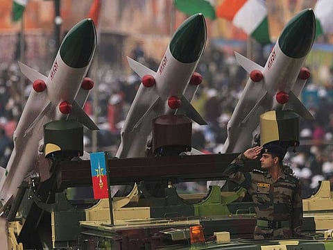 In this file photo taken on January 26, 2022 a soldier salutes next to an Akash missile system during India's 73rd Republic Day parade at the Rajpath in New Delhi. India's military accidentally fired a missile into Pakistan, New Delhi's defence ministry said on March 11, calling it "deeply regrettable". 