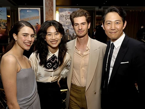 Margaret Qualley, HoYeon Jung, Andrew Garfield and Lee Jeong-jae attend the AFI Awards Luncheon.