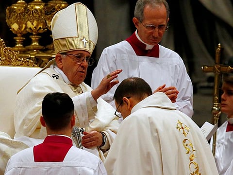 Pope Francis blesses Mons. Waldemar Stanislaw Sommertag during the Episcopal Ordination at Saint Peter's Basilica at the Vatican in a file photo.