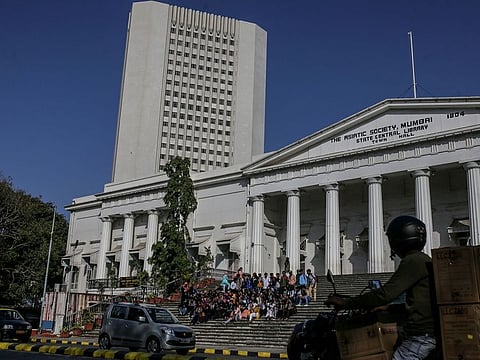The Reserve Bank of India (RBI) headquarters (left) in Mumbai. RBI is understood to have supplied the interbank market with $7 billion in dollar supplies last week.