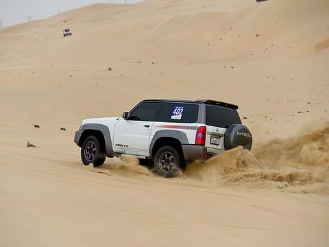 Nissan cars conquering the desert.