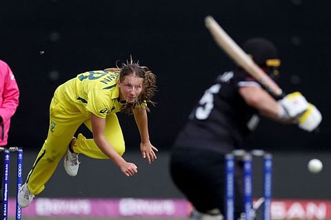Australia's Darcie Brown (left) bowls to New Zealand's Katey Martin during the 2022 Women's Cricket World Cup match between New Zealand and Australia at the Basin reserve in Wellington.