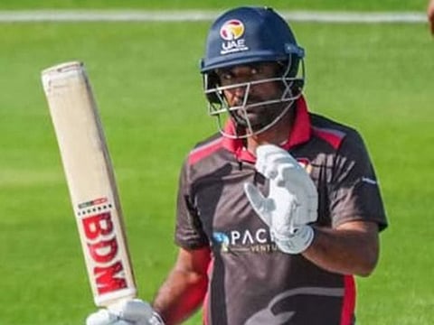 Asif Khan acknowledges the cheers after reaching his half-century against PNG on Tuesday.