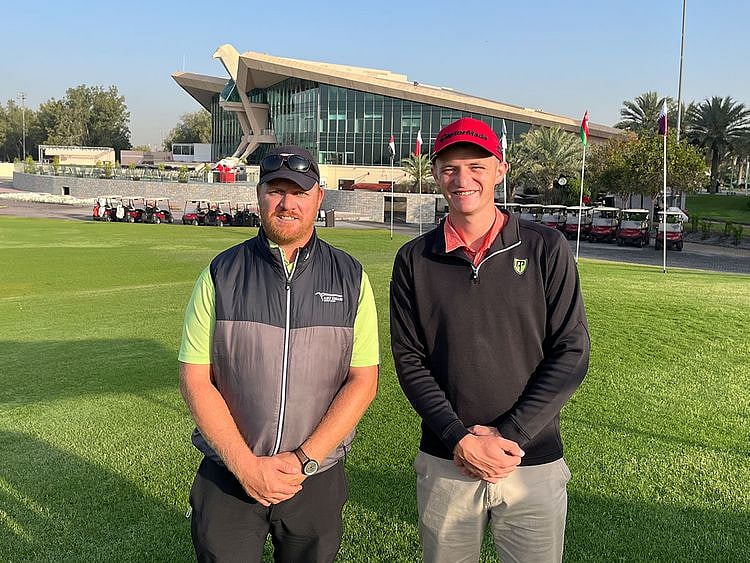 Dean Geyer, Golf Course Superintendent, with intern Allan Williams at Abu Dhabi Golf Club.