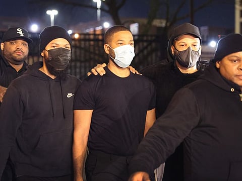 Former "Empire" actor Jussie Smollett (light mask) is released from the Cook County Department of Corrections detention center on March 16, 2021 in Chicago, Illinois. Smollett began serving a 150-day sentence on March 10, after being found guilty late last year of lying to police about a hate crime after he reported to police that two masked men physically attacked him, yelling racist and anti-gay remarks near his Chicago home in 2019. Today an appellate court judge ordered him freed while his case is appealed.  
