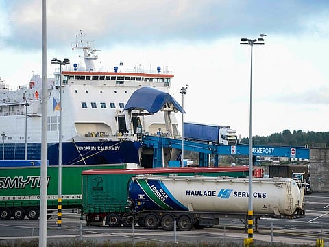 Trucks disembark from the European Causeway ferry, operated by P&O Ferries, at the Port of Larne in the UK.