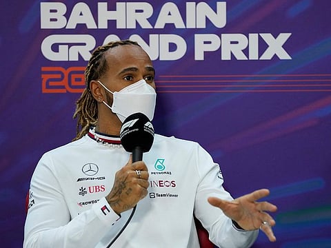 Mercedes driver Lewis Hamilton of Britain speaks during a press conference at the Formula One Bahrain International Circuit in Sakhir, Bahrain. The Bahrain Formula One Grand Prix will take place on Sunday.