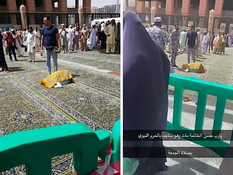 The worshipper appears lying on the ground and covered with a prayer rug at the Prophet Mohammed's Mosque. 