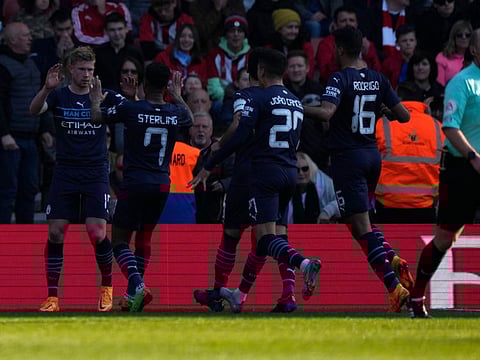 Manchester City's Kevin De Bruyne (left) celebrates with teammates after scoring his side's second goal during the FA Cup match against Southampton at St Mary's stadium in Southampton, England.