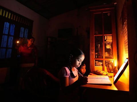 The country has no power for 7 1/2 hours a day, forcing children to study under homemade kerosene oil lamps, fishermen to limit fishing and shops and industries to limit production and business.  