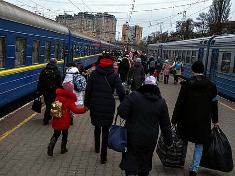 Civilians fleeing Russia's attack of Ukraine prepare to board an evacuation train, in Odesa, Ukraine, March 16, 2022. Picture taken March 16, 2022.