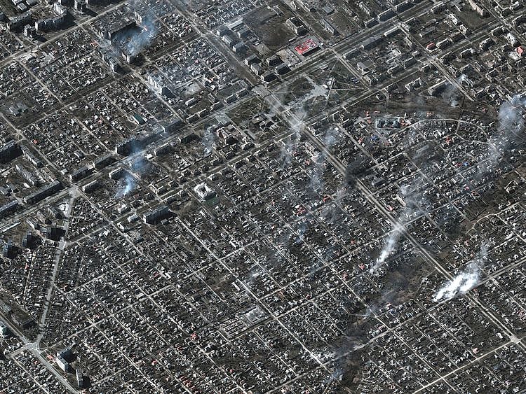 A satellite image shows an overview of burning buildings in Livoberezhnyi district, Mariupol, on March 22, 2022.