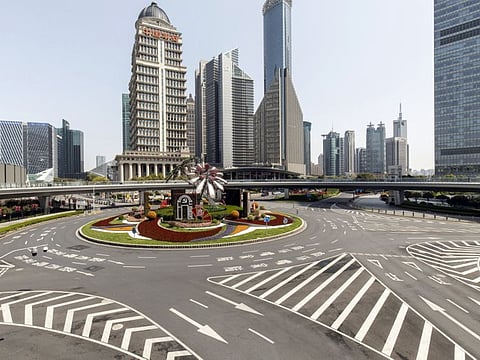 A deserted thoroughfare in the Lujiazui Financial District in Shanghai, on March 23, 2022. China's worst outbreak in more than two years continues to fester, with daily infections nearing 5,000 today. 