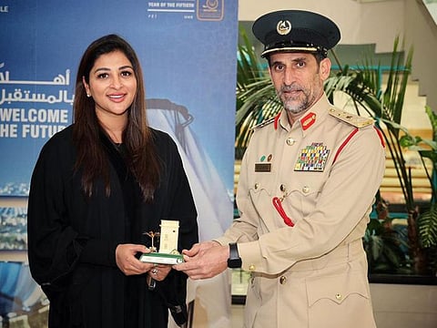 Major General Abdullah Khalifa Al Merri, Commander-in-Chief of Dubai Police, with Alisha Moopen.