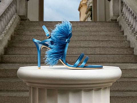 The Sonia Sandal feature a plume of blue feathers inspired by the hats in the new season of the show.