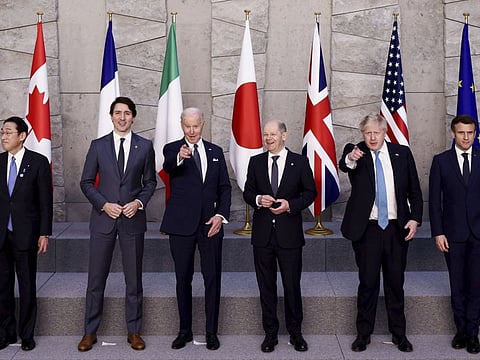 From left: Japan's Prime Minister Fumio Kishida, Canada's Prime Minister Justin Trudeau, US President Joe Biden, Germany's Chancellor Olaf Scholz, British Prime Minister Boris Johnson and France's President Emmanuel Macron pose for a G7 leaders' group photo during a Nato  summit in Brussels, on March 24, 2022.  