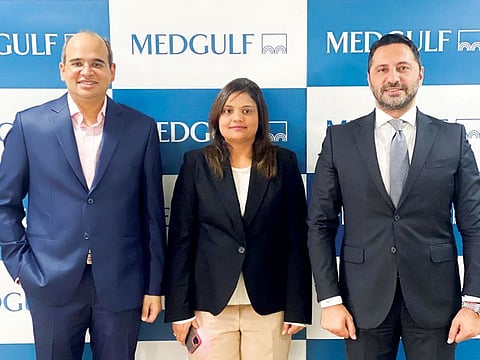From left: Gaurav Baid, Associate Partner at AJMS Group, Komal Jajoo, Partner – International Operations, AJMS Group, and Shadi Al Mahameed, General Manager, MEDGULF – UAE