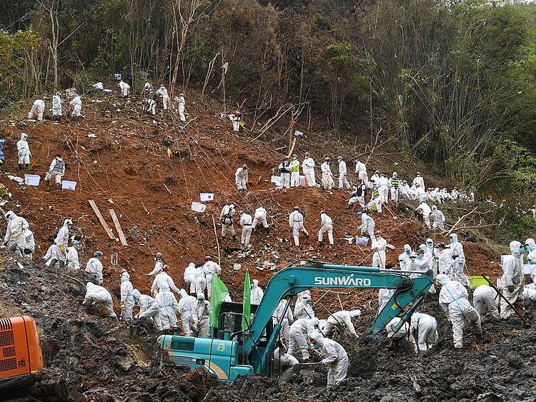 Rescuers conduct search and rescue work at the core site of the plane crash in Tengxian County, southern China's Guangxi Zhuang Autonomous Region, on March 25, 2022. 
