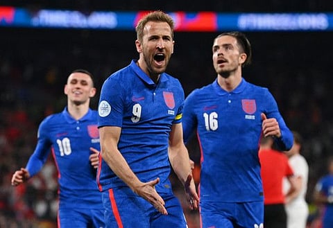 England's Harry Kane celebrates scoring their second goal.