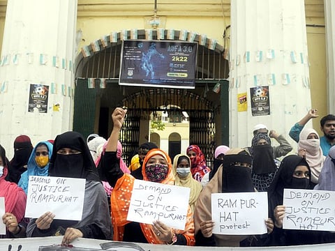 Students of Aliah University stage a protest against the Birbhum incident, in Kolkata.