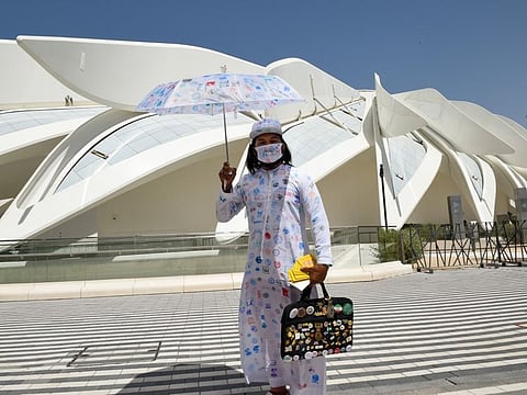 Indian expat Shamsheer Keechery says he has toured all Expo pavilions seven times, with stamps on different 'passports' and objects