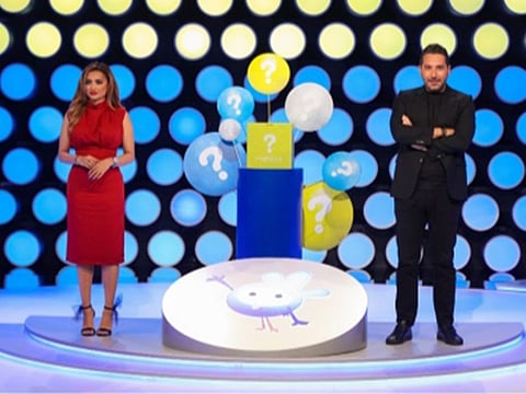 Mahzooz hosts during the draw