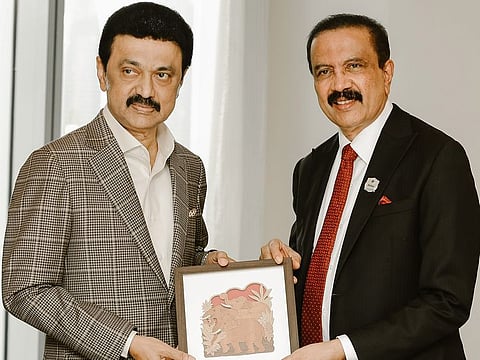 Dr. Azad Moopen with M.K. Stalin. Aster currently operates 14 hospitals in India. 