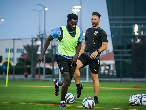 Mumbai City FC captain, Senegalese Mourtada Fall (left) during a training session under the watchful eyes of head coach Des Buckingham during their acclimatisation camp at the Al Forsan in Abu Dhabi.