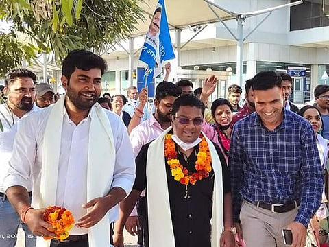 Venzy Viegas with supporters following his victory in Benaulim constituency on March 10, 2022.