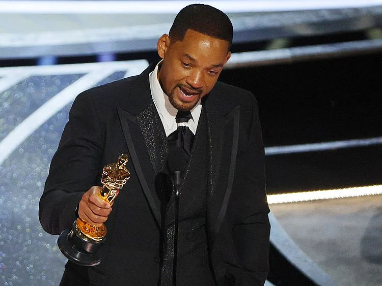 Will Smith accepts the Oscar for Best Actor in "King Richard" at the 94th Academy Awards in Hollywood, Los Angeles. 