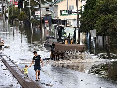 A view of a flooded road following heavy rains in Lismore, New South Wales, Australia.