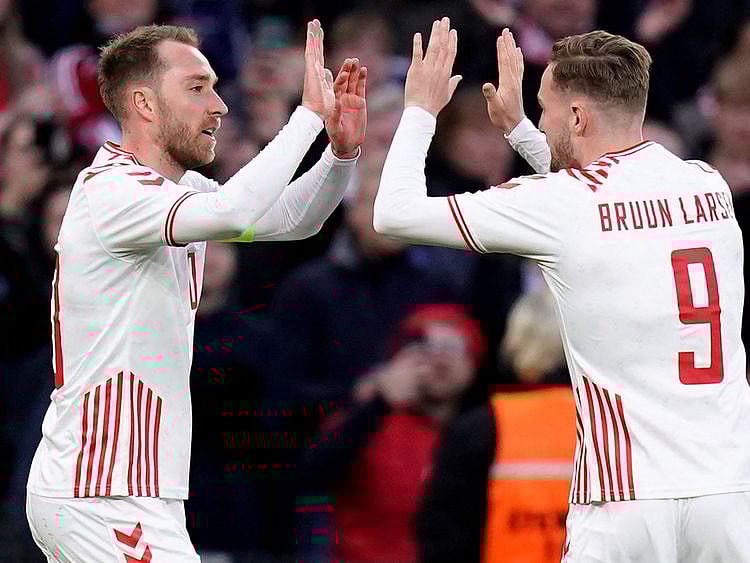 Denmark's Christian Eriksen celebrates scoring their third goal against Serbia