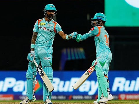 IPL debutant Ayush Badoni (right) being congratulated by Krunal Pandya on reaching his half-century for Lucknow Super Giants.
