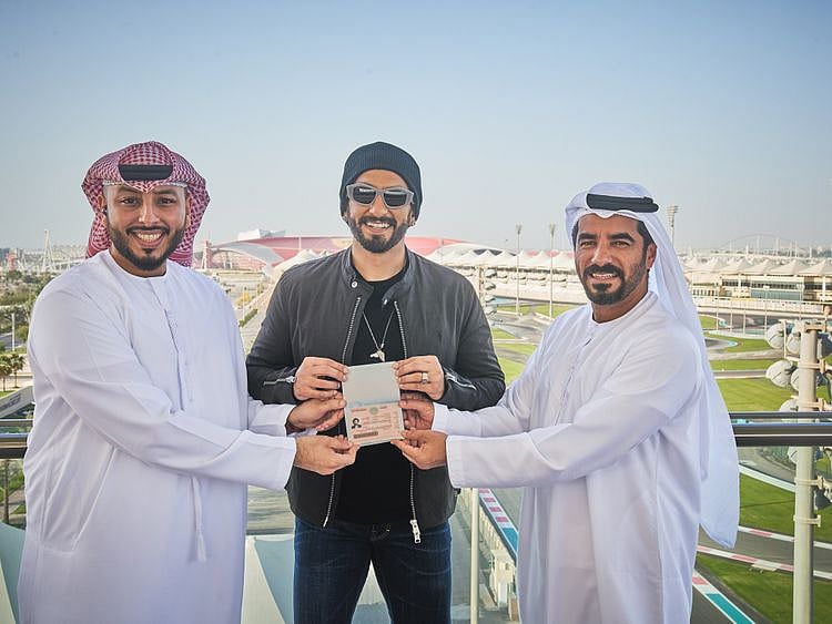 Ranveer Singh getting the UAE Golden Visa in the presence of Mohamed Abdalla Al Zaabi, CEO of Miral
