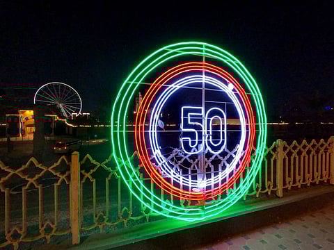 Bridge on Khalidiya Street in Sharjah is illuminated with decorative lights during UAE's 50th National Day celebrations.