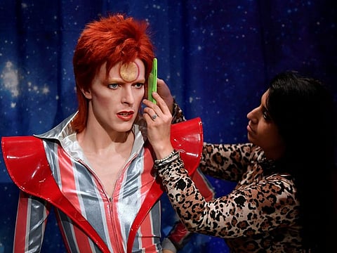 Studios artist Caryn Mitman works on a new wax work representation of David Bowie ahead of the opening of a newly redesigned Music Festival zone of contemporary and historically famous singers and musicians at Madame Tussauds, in London, Britain March 31, 2022.