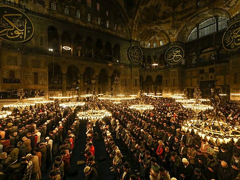 Worshippers perform a night prayer called 'taraweeh' on the eve of the first day of Ramadan at Hagia Sophia mosque in Istanbul, on April 1, 2022.  