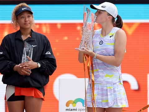 Iga Swiantek of Poland celebrates her win over Naomi Osaka of Japan during the women's final of the Miami Open at Hard Rock Stadium in Miami Gardens, Florida.