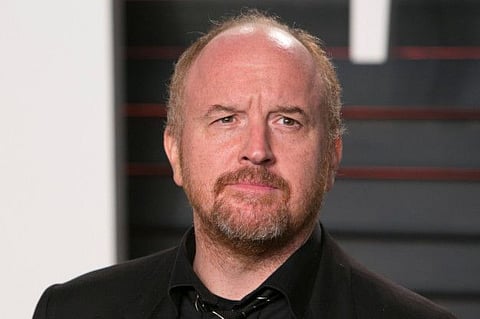 In this file photo taken on February 28, 2016 US comedian Louis CK poses as he arrives to the 2016 Vanity Fair Oscar Party in Beverly Hills, California.