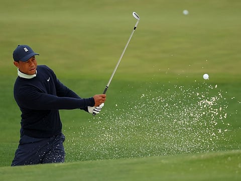 Tiger Woods of the United States warms up on the range during a practice round prior to the Masters at Augusta National Golf Club in Augusta, Georgia yesterday.