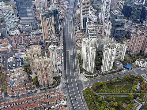 Empty roads during a phased lockdown due to Covid-19 in Shanghai, China, on Tuesday, April 5, 2022.