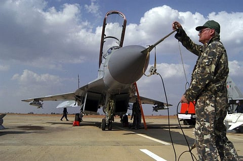 A Russian technician prepares for the take-off of the MIG 29 M2 ahead of the 5th edition of the Aero India show at the Yelahanka Air Force Station in Bangalore, in a file picture.