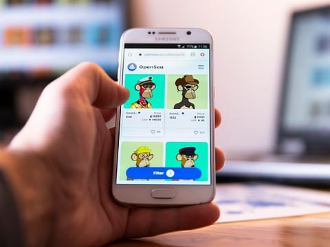  Bored Ape NFT maker raises $285 million of crypto in record virtual land sale, disrupting the entire Ethereum network. Here's what happened.
