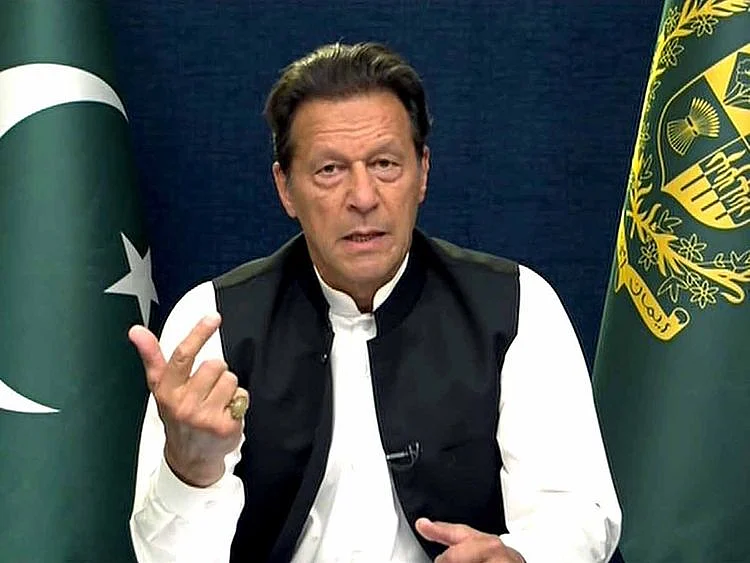 Pakistan Prime Minister Imran Khan addresses the nation, in Islamabad on Friday.